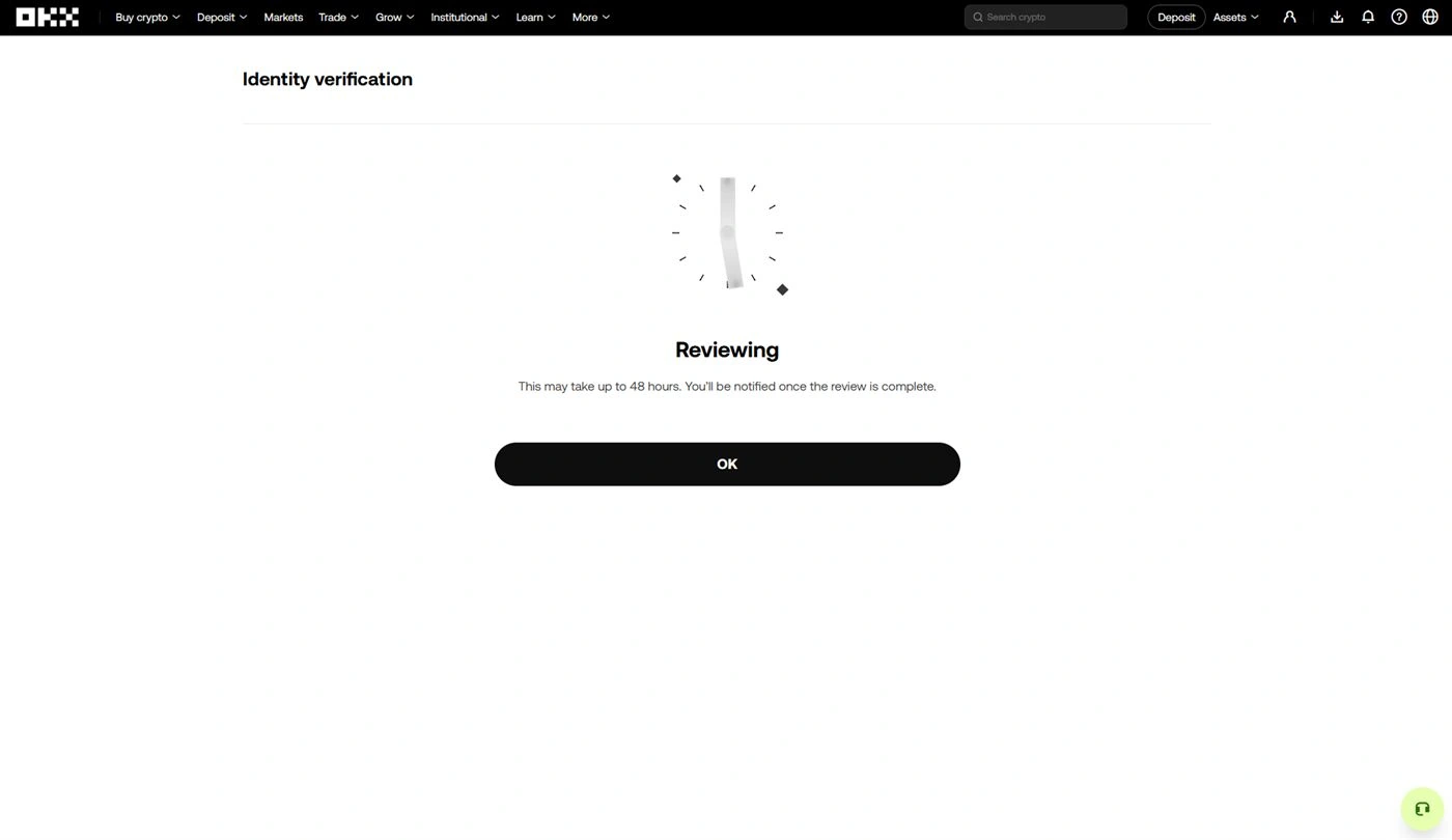 Écran OKX Identity verification Reviewing